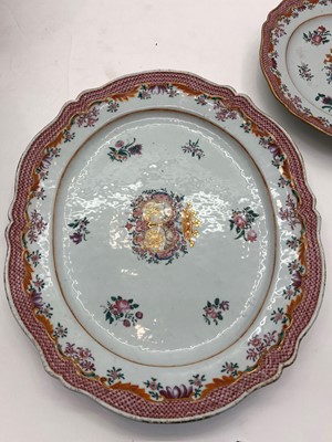 Lot 69 - An export armorial porcelain part dinner service