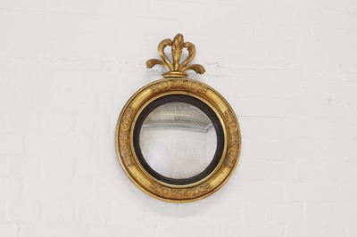 Lot 267 - A William IV carved gilt-gesso convex mirror