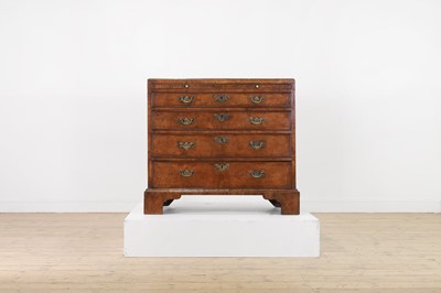 Lot 75 - A burr elm caddy-top chest of drawers