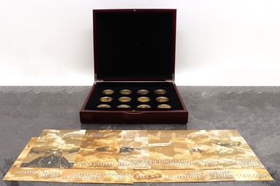 Lot 76 - A set of twelve gold plated 999 fine silver proof crown size coins
