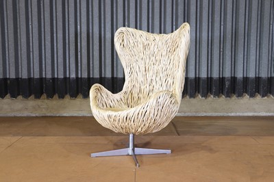 Lot 15 - A wicker egg chair after Arne Jacobsen for Fritz Hansen