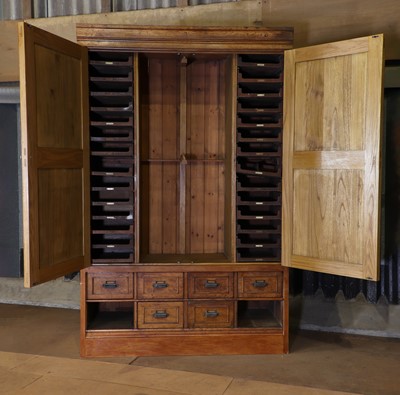 Lot 4 - A golden oak haberdasher's cabinet