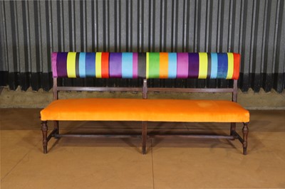 Lot 8 - An upholstered provincial beech bench