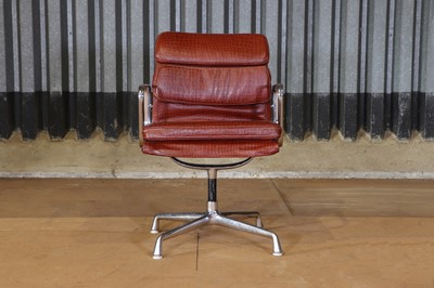 Lot 12 - A chrome and leather desk chair after Charles and Ray Eames