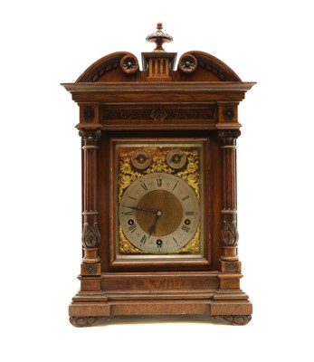 Lot 245 - A Victorian oak musical bracket clock