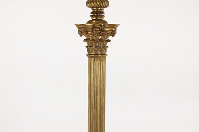 Lot 14 - A near pair of telescopic brass column floor lamps