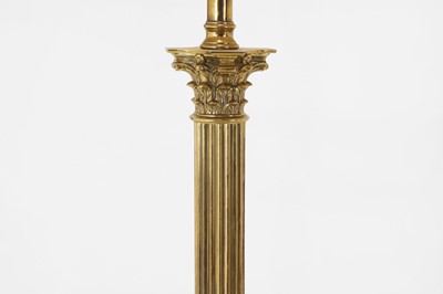 Lot 14 - A near pair of telescopic brass column floor lamps