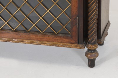 Lot 27 - A Regency rosewood, painted and parcel-gilt pier cabinet