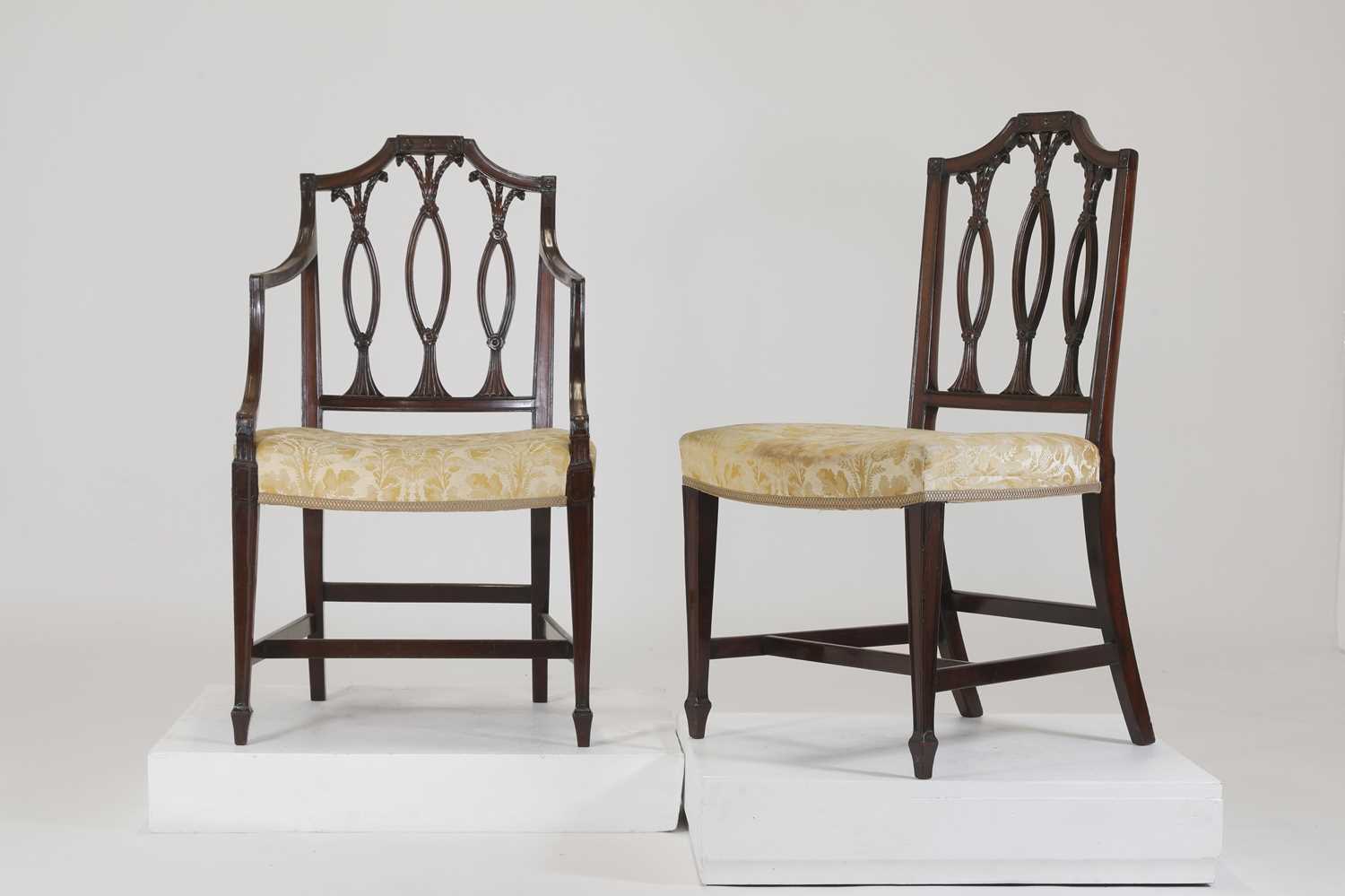 Lot 54 - A set of eight George III-style mahogany dining chairs