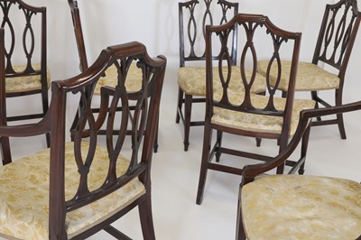 Lot 54 - A set of eight George III-style mahogany dining chairs