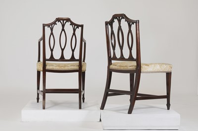 Lot 54 - A set of eight George III-style mahogany dining chairs