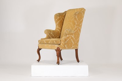 Lot 77 - A George I walnut wingback armchair