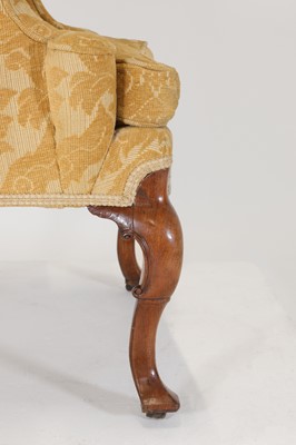 Lot 77 - A George I walnut wingback armchair