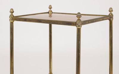 Lot 60 - A pair of Regency-style mahogany and brass étagères