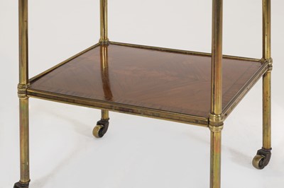 Lot 60 - A pair of Regency-style mahogany and brass étagères