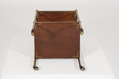 Lot 60 - A pair of Regency-style mahogany and brass étagères