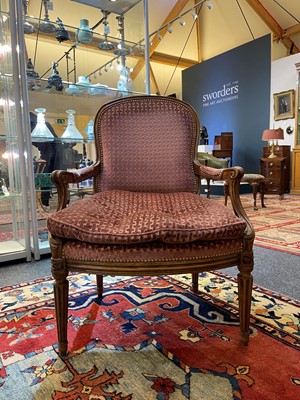 Lot 68 - A Louis XVI Transitional beech fauteuil à la reine