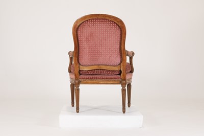 Lot 68 - A Louis XVI Transitional beech fauteuil à la reine