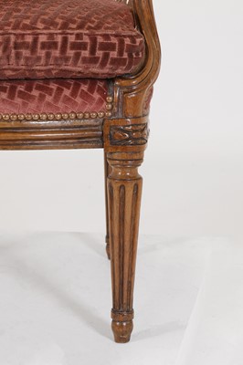 Lot 68 - A Louis XVI Transitional beech fauteuil à la reine