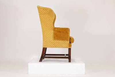 Lot 85 - A George III-style mahogany wingback armchair