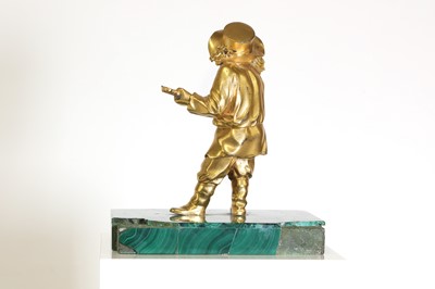 Lot 72 - A gilt-bronze figure of a musician