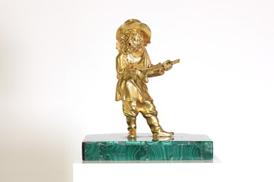 Lot 72 - A gilt-bronze figure of a musician