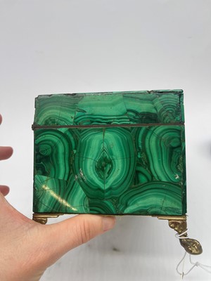 Lot 57 - A malachite trinket box