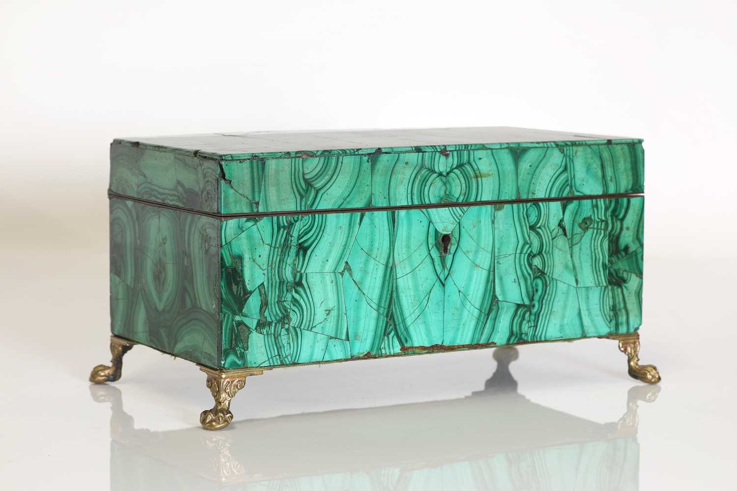 Lot 57 - A malachite trinket box