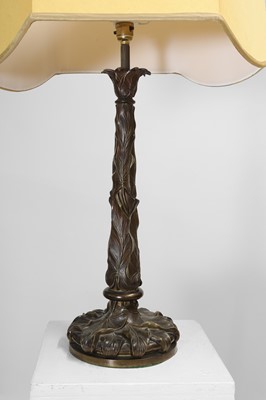 Lot 69 - A pair of patinated bronze table lamps