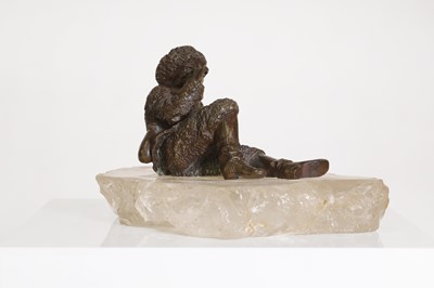 Lot 70 - A bronze figure of a reclining hunter