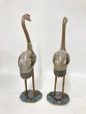 Lot 89 - A pair of cloisonné cranes