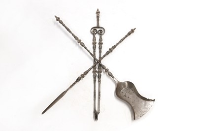 Lot 101 - A set of Charles II-style steel and silver fire tools