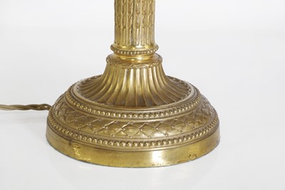 Lot 62 - A Directoire-style ormolu three-light bouillotte lamp