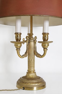 Lot 62 - A Directoire-style ormolu three-light bouillotte lamp