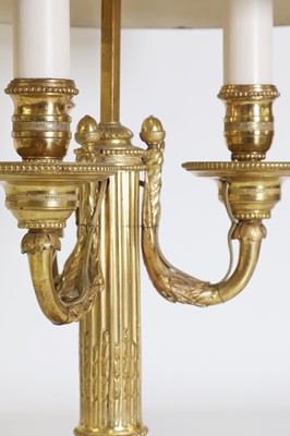 Lot 62 - A Directoire-style ormolu three-light bouillotte lamp