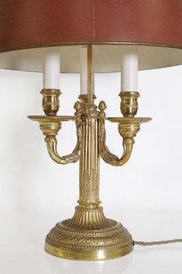 Lot 62 - A Directoire-style ormolu three-light bouillotte lamp