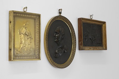 Lot 109 - A bronze oval portrait plaque