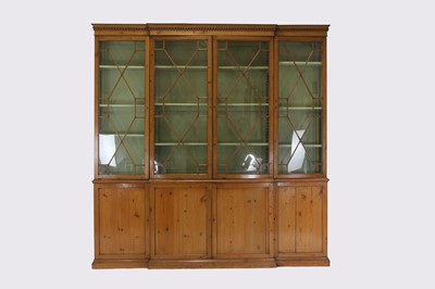 Lot 120 - A George III pine breakfront library bookcase