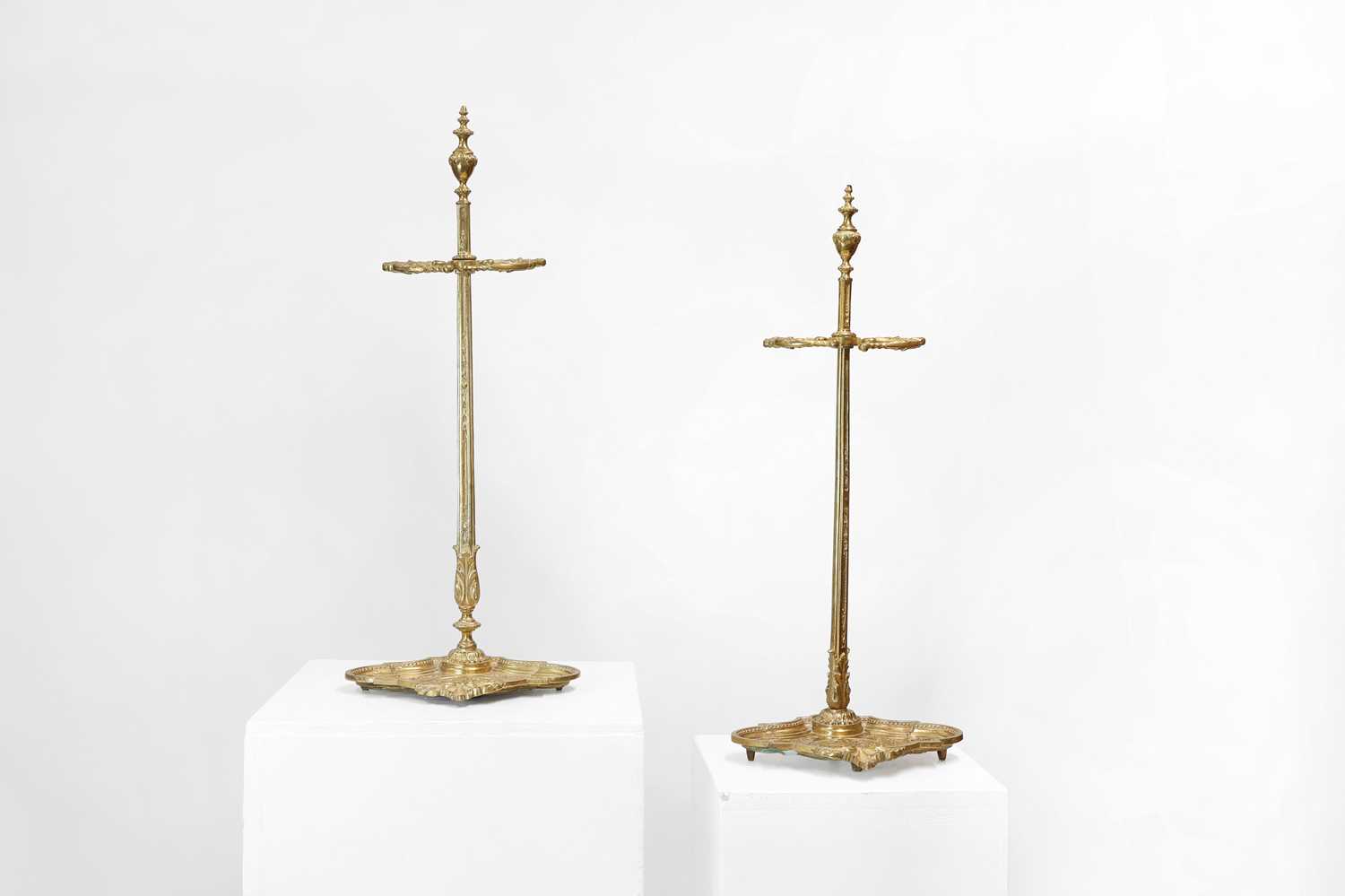 Lot 125 - A pair of brass umbrella stands