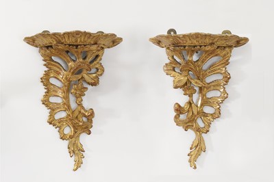 Lot 118 - A pair of carved giltwood wall brackets