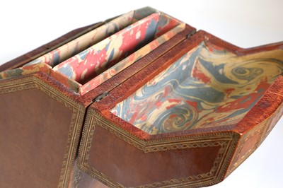Lot 127 - A tooled leather stationery casket