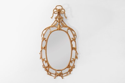Lot 136 - A George III giltwood oval mirror