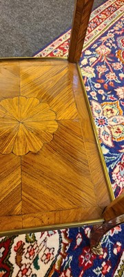 Lot 174 - A Louis XV kingwood and parquetry occasional table