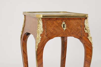 Lot 174 - A Louis XV kingwood and parquetry occasional table