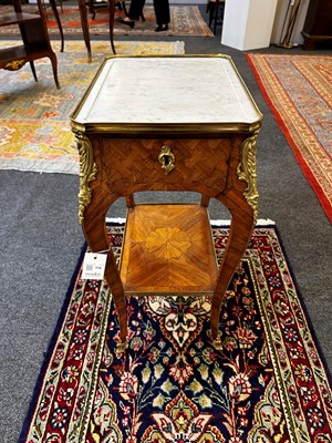 Lot 174 - A Louis XV kingwood and parquetry occasional table