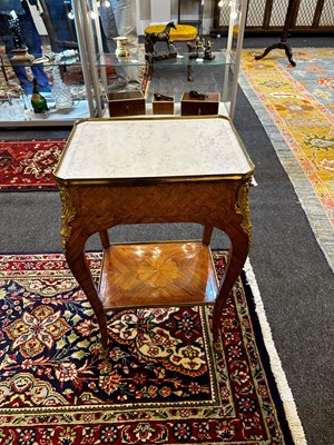 Lot 174 - A Louis XV kingwood and parquetry occasional table