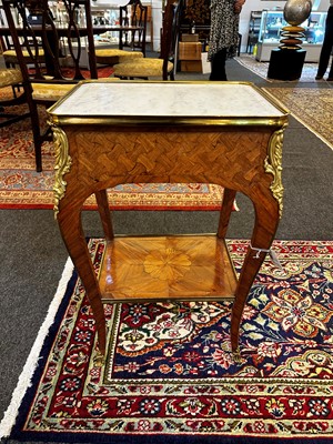 Lot 174 - A Louis XV kingwood and parquetry occasional table