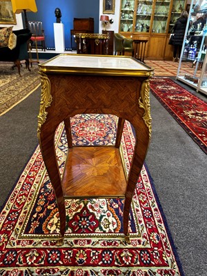 Lot 174 - A Louis XV kingwood and parquetry occasional table