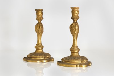 Lot 106 - A pair of Louis XV-style ormolu candlesticks