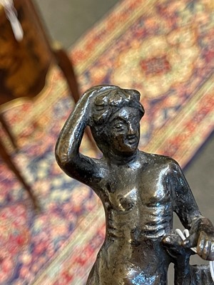 Lot 164 - A patinated bronze figure after the antique